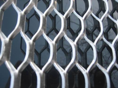  The picture shows different colors and hole shapes aluminum expanded metal facade meshes.