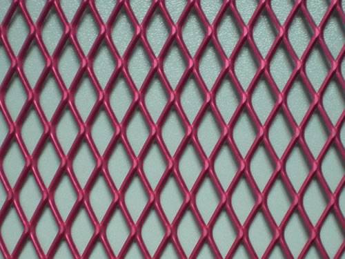 Green aluminum expanded metal meshes with diamond holes are installed on the architectural building facades by trellis.