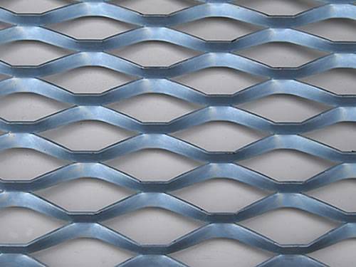 Golden aluminum expanded metal meshes with diamond holes are installed on interior wall.