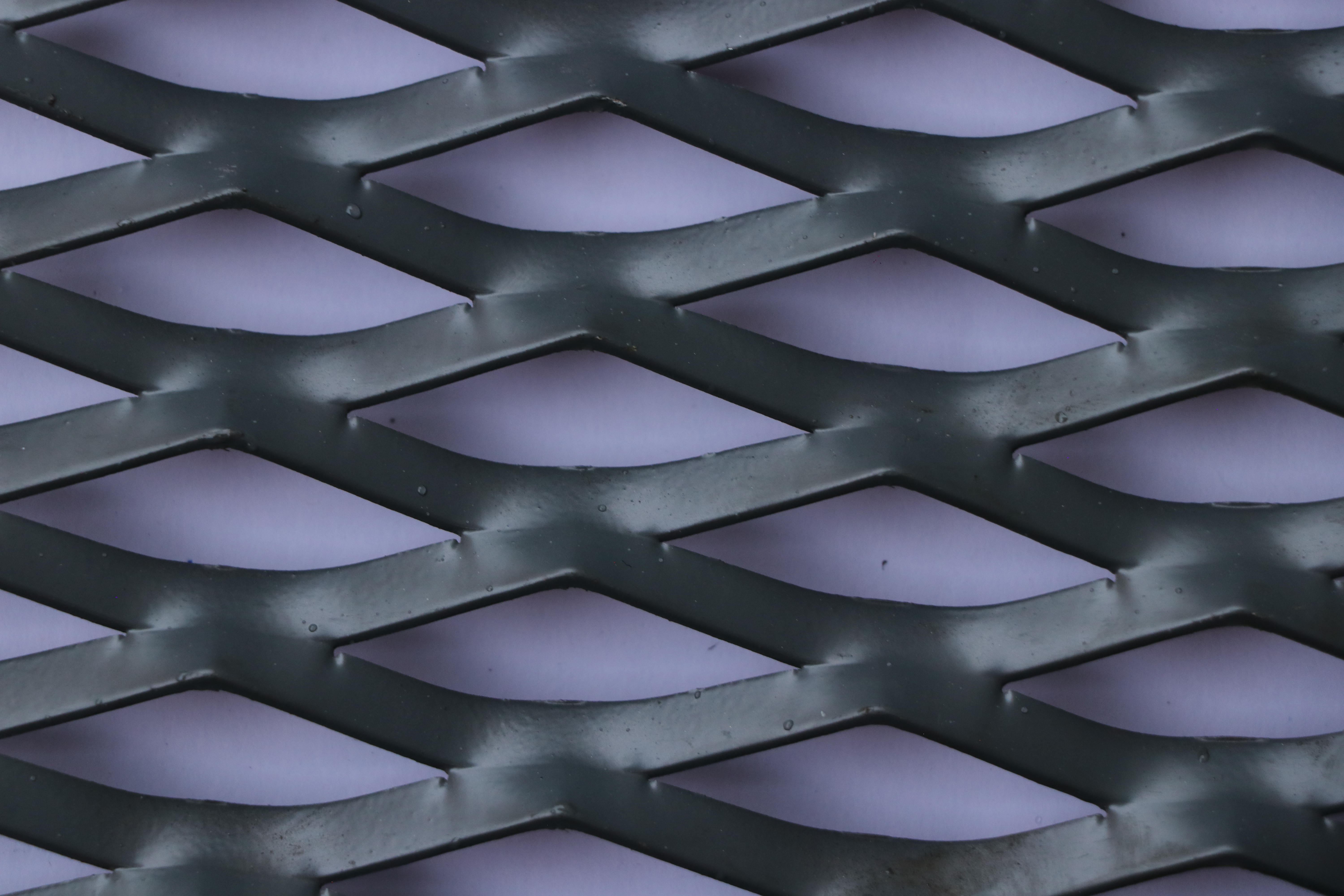  The picture shows different colors and hole shapes aluminum expanded metal facade meshes.