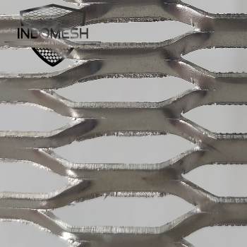 Golden aluminum expanded metal meshes with diamond holes are installed on interior wall.